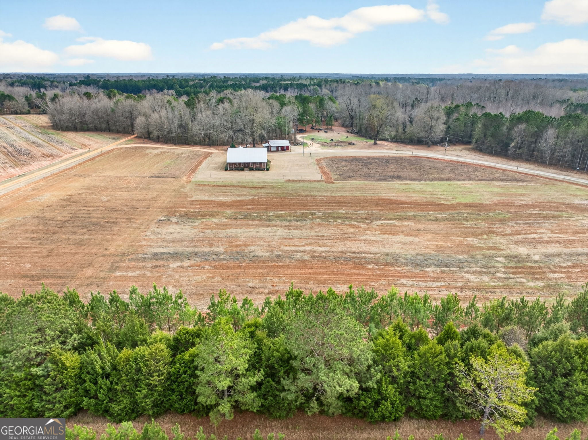 2770 Jones Road Sandersville, GA 31082 - Photo 74 of 80 a view of a swimming pool and an outdoor seating