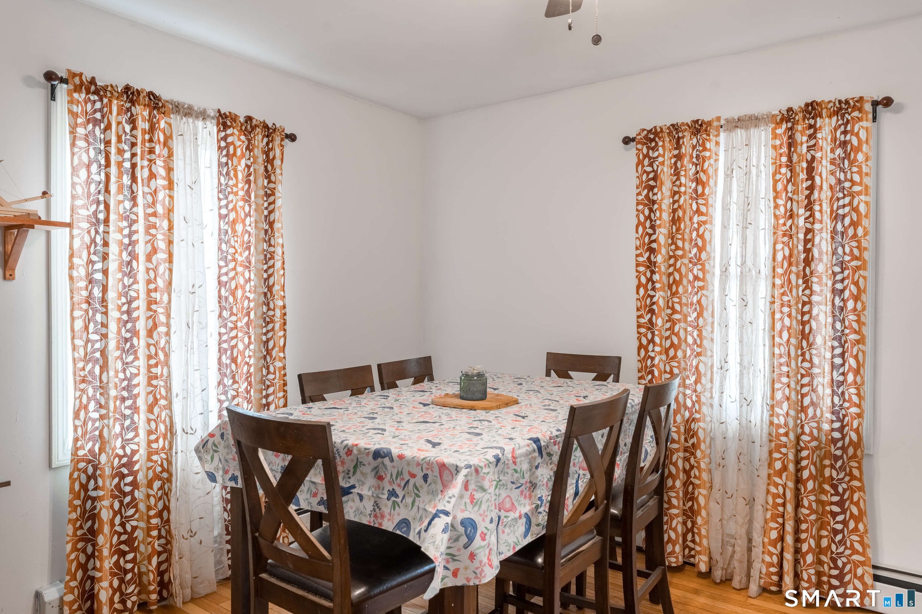 379 Christian Hill Road Brooklyn, CT 06234 - Photo 13 of 40 a view of a dining room with furniture and chandelier