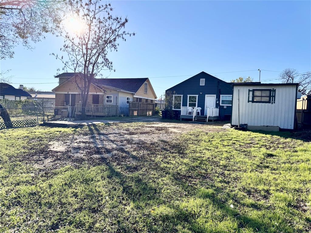 202 North Riverside Drive Fort Worth, TX 76111 - Photo 23 of 25 a view of a house with a yard