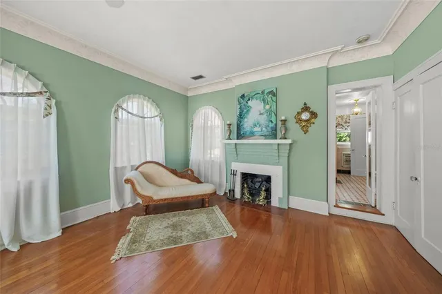 a bedroom with bed and a window