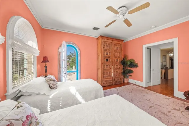 a living room with furniture a fireplace and a window