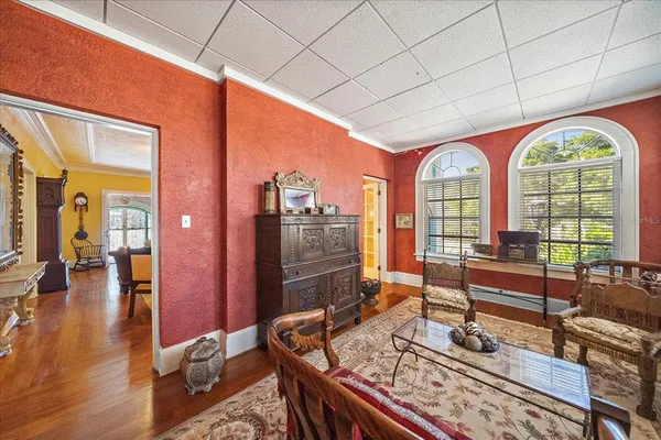 a view of an entryway with wooden floor