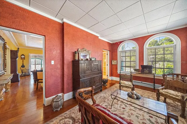 a view of an entryway with wooden floor