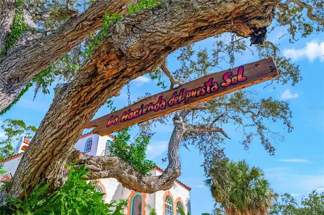 a bathroom with a bathtub a sink and a mirror