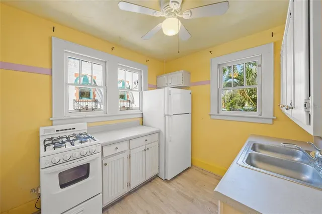 a view of swimming pool with outdoor seating and seating area