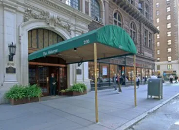 a view of a building with sitting area