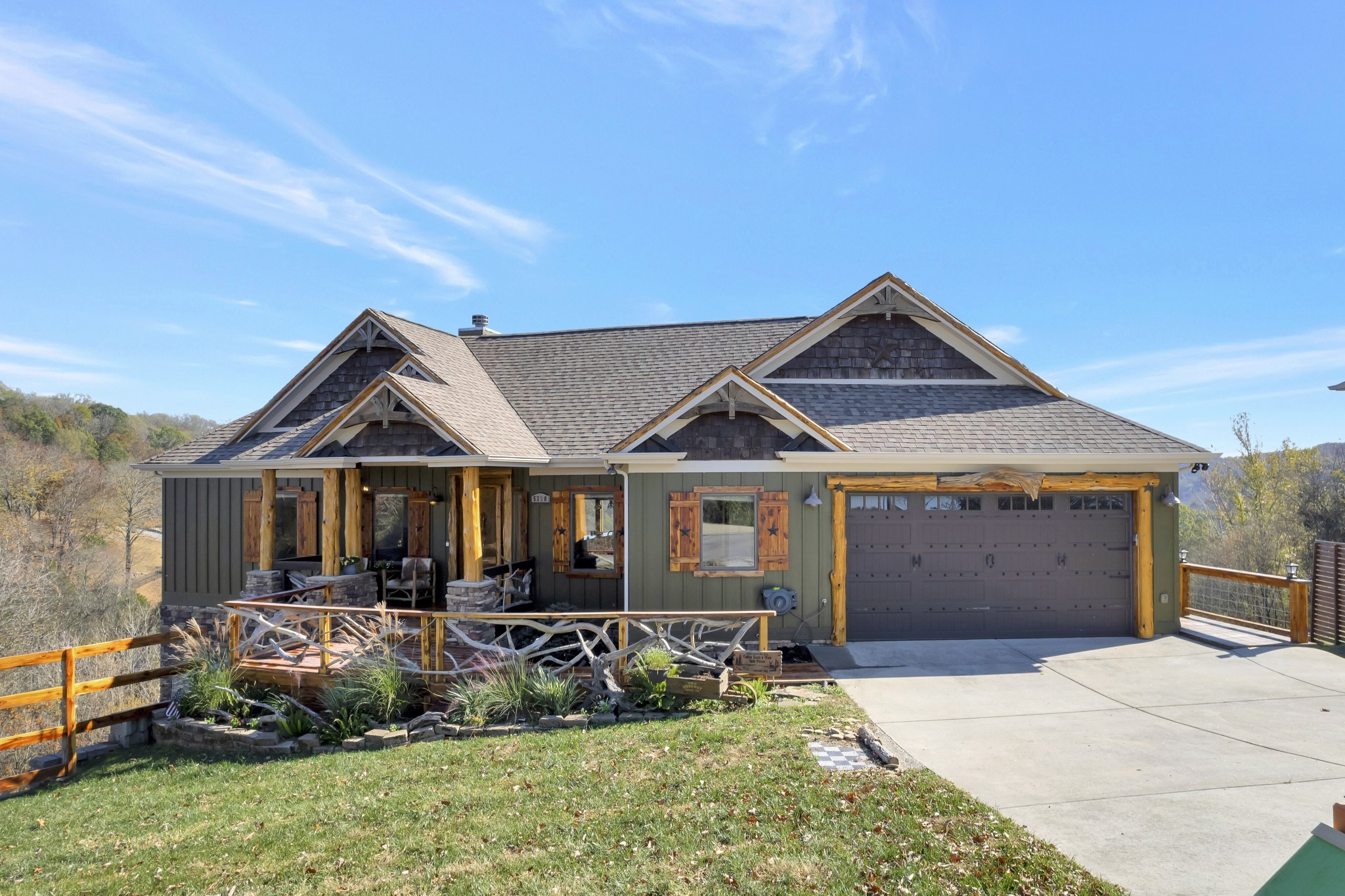 a front view of a house with sitting space