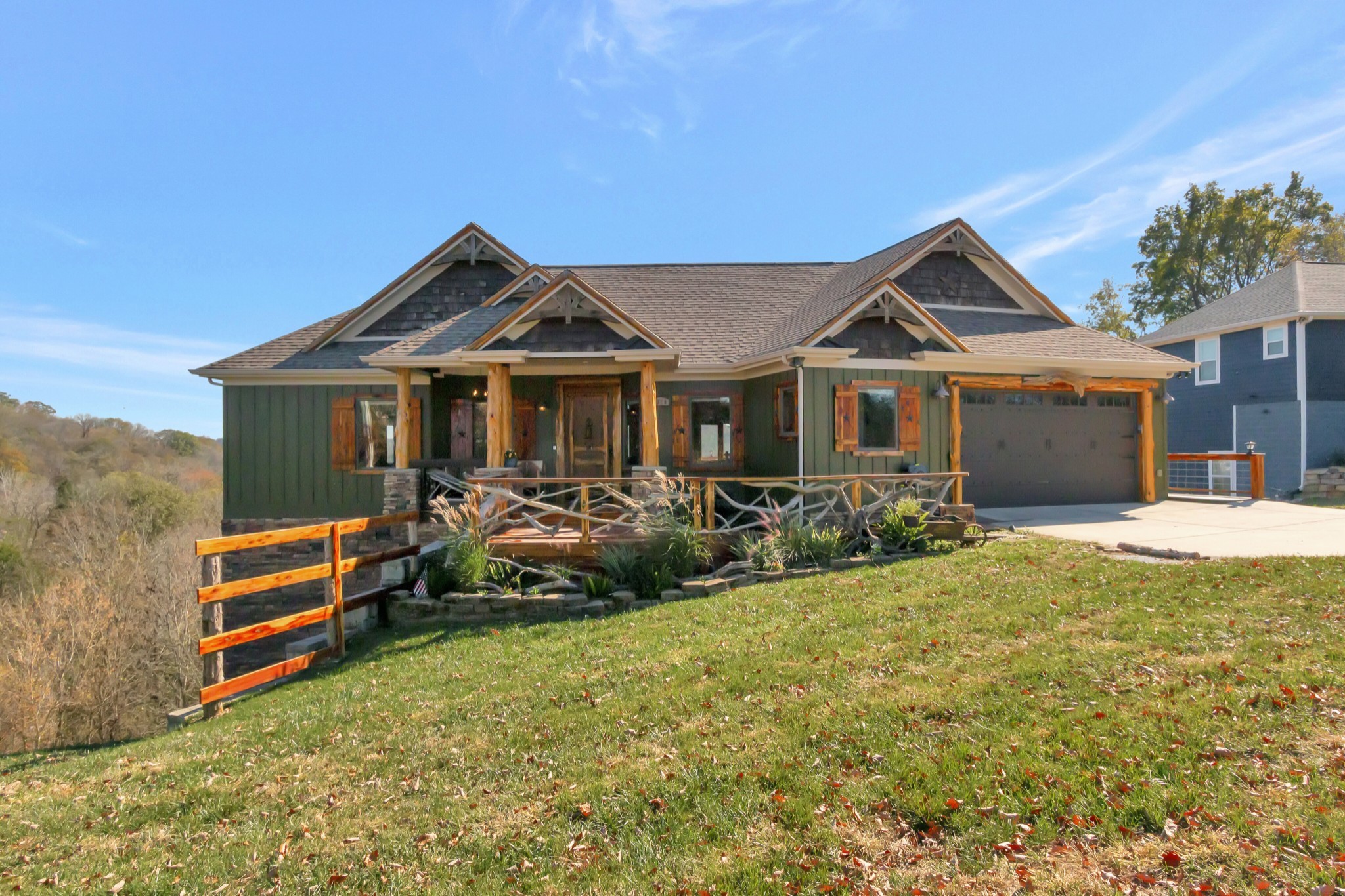 5320 Coconut Ridge Road Smithville, TN 37166 - Photo 2 of 52 a front view of a house with yard and green space