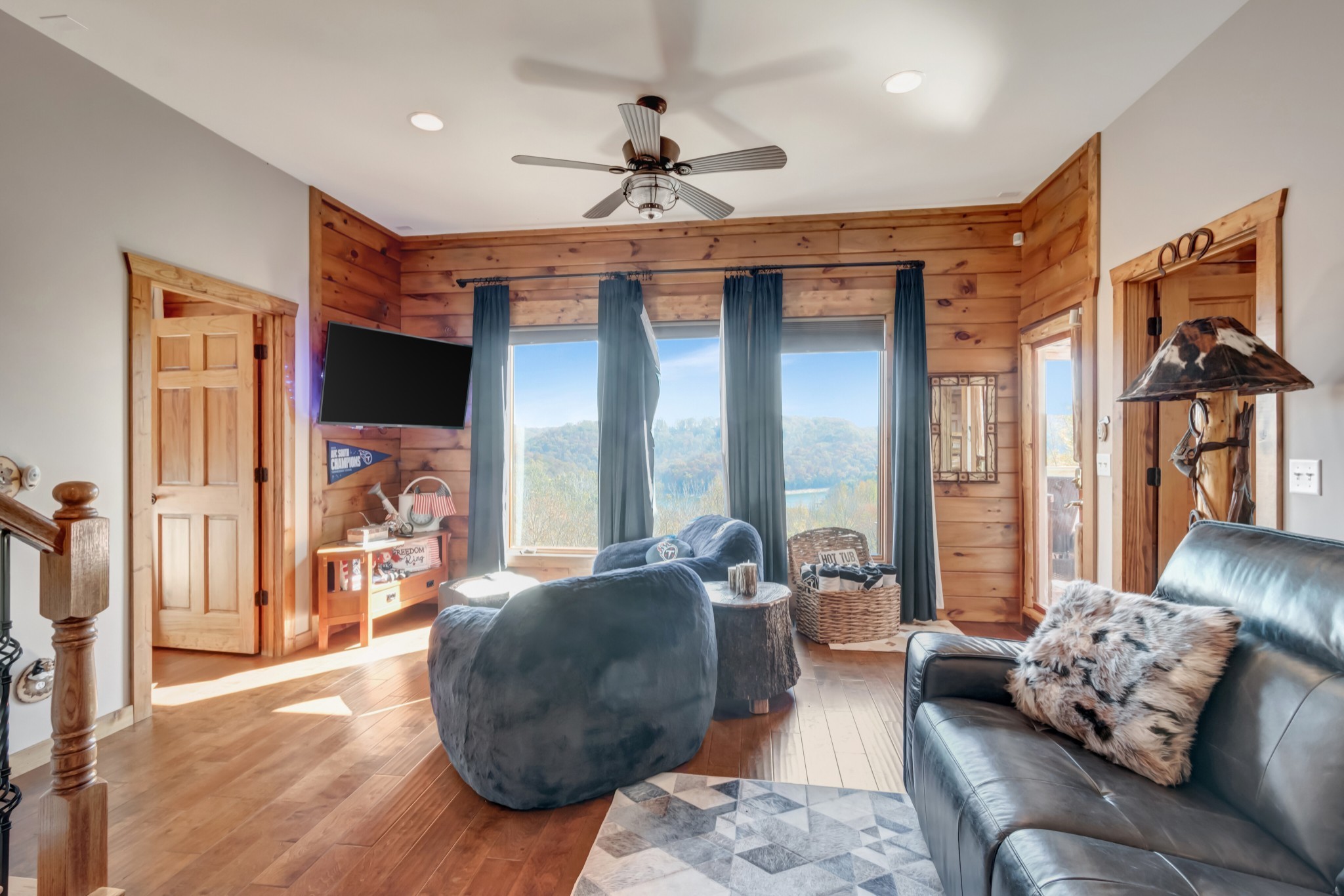 5320 Coconut Ridge Road Smithville, TN 37166 - Photo 36 of 52 a living room with furniture and a flat screen tv