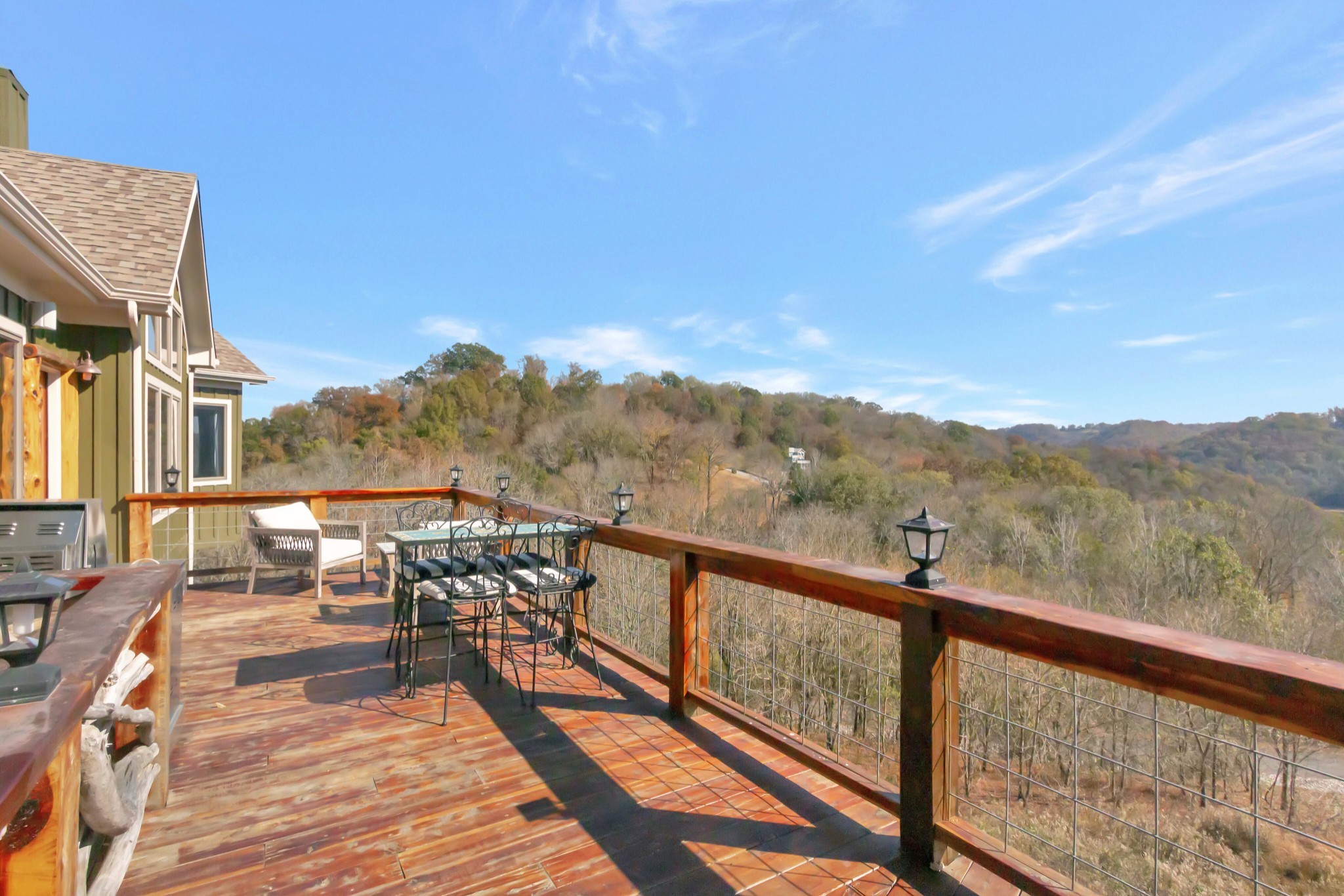 5320 Coconut Ridge Road Smithville, TN 37166 - Photo 51 of 52 a view of a balcony with mountain view and wooden floor