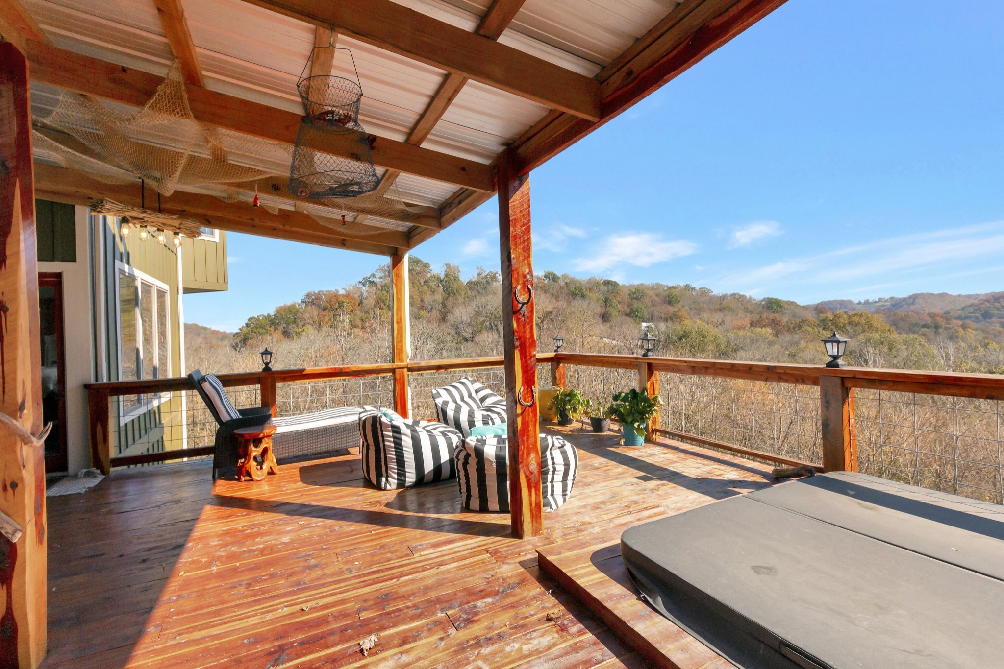 5320 Coconut Ridge Road Smithville, TN 37166 - Photo 52 of 52 a view of a balcony with chairs and wooden floor