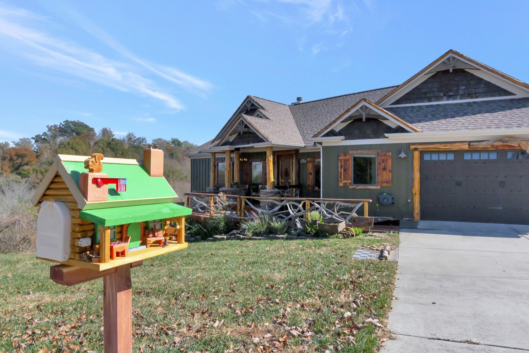 5320 Coconut Ridge Road Smithville, TN 37166 - Photo 6 of 52 a front view of a house with garden