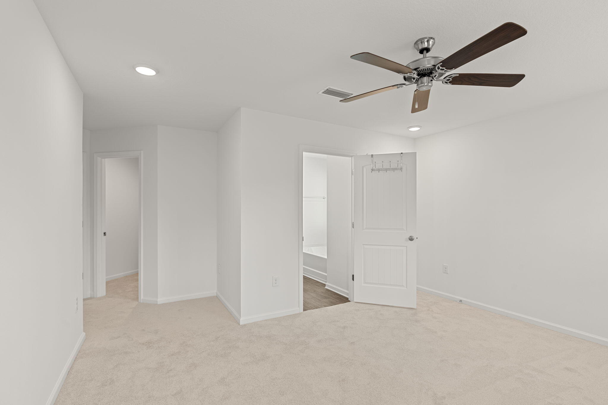 545 Earl Godwin Road Freeport, FL 32439 - Photo 18 of 50 a view of a ceiling fan in a room