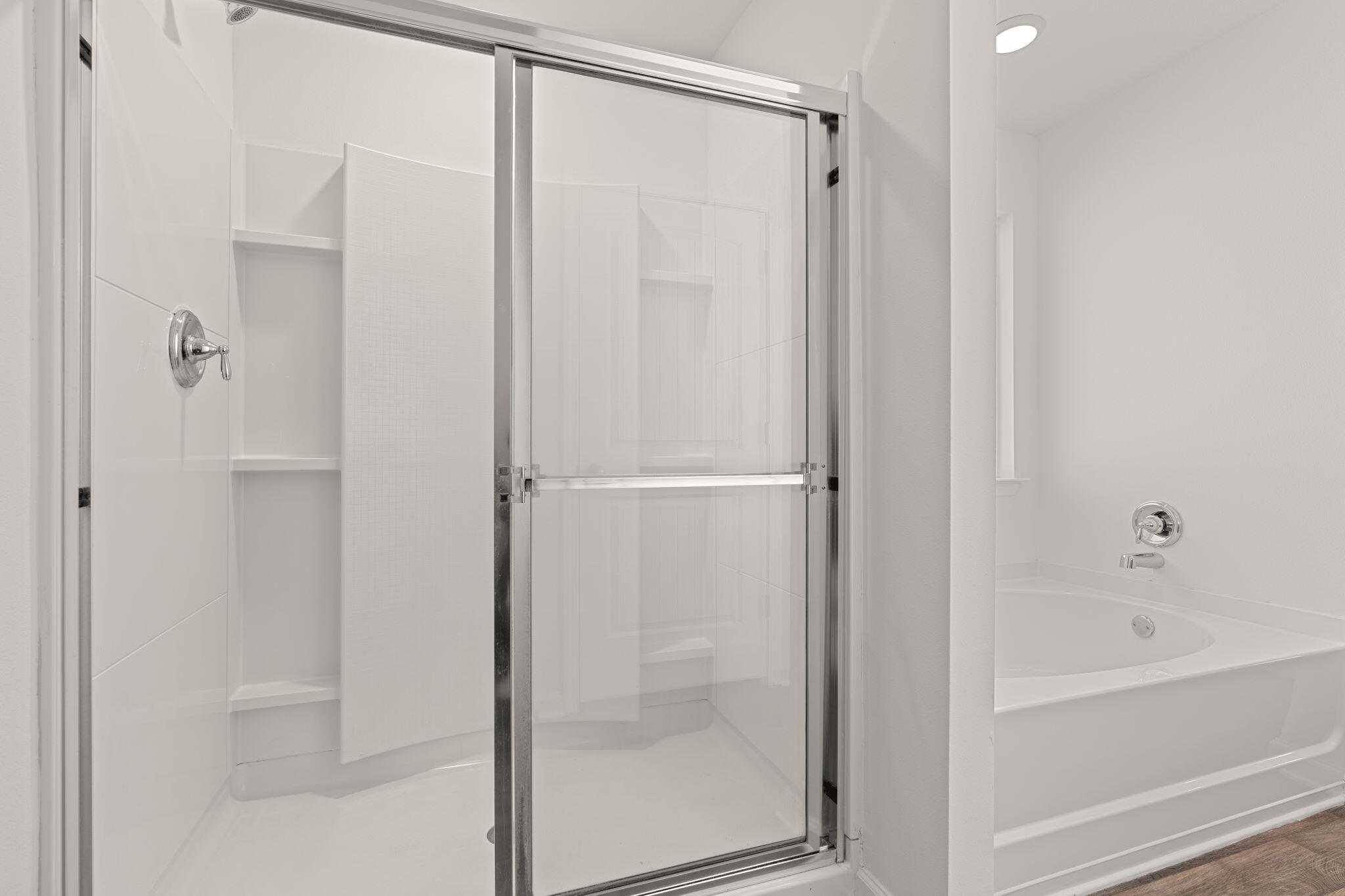 545 Earl Godwin Road Freeport, FL 32439 - Photo 22 of 50 a bathroom with a glass shower door