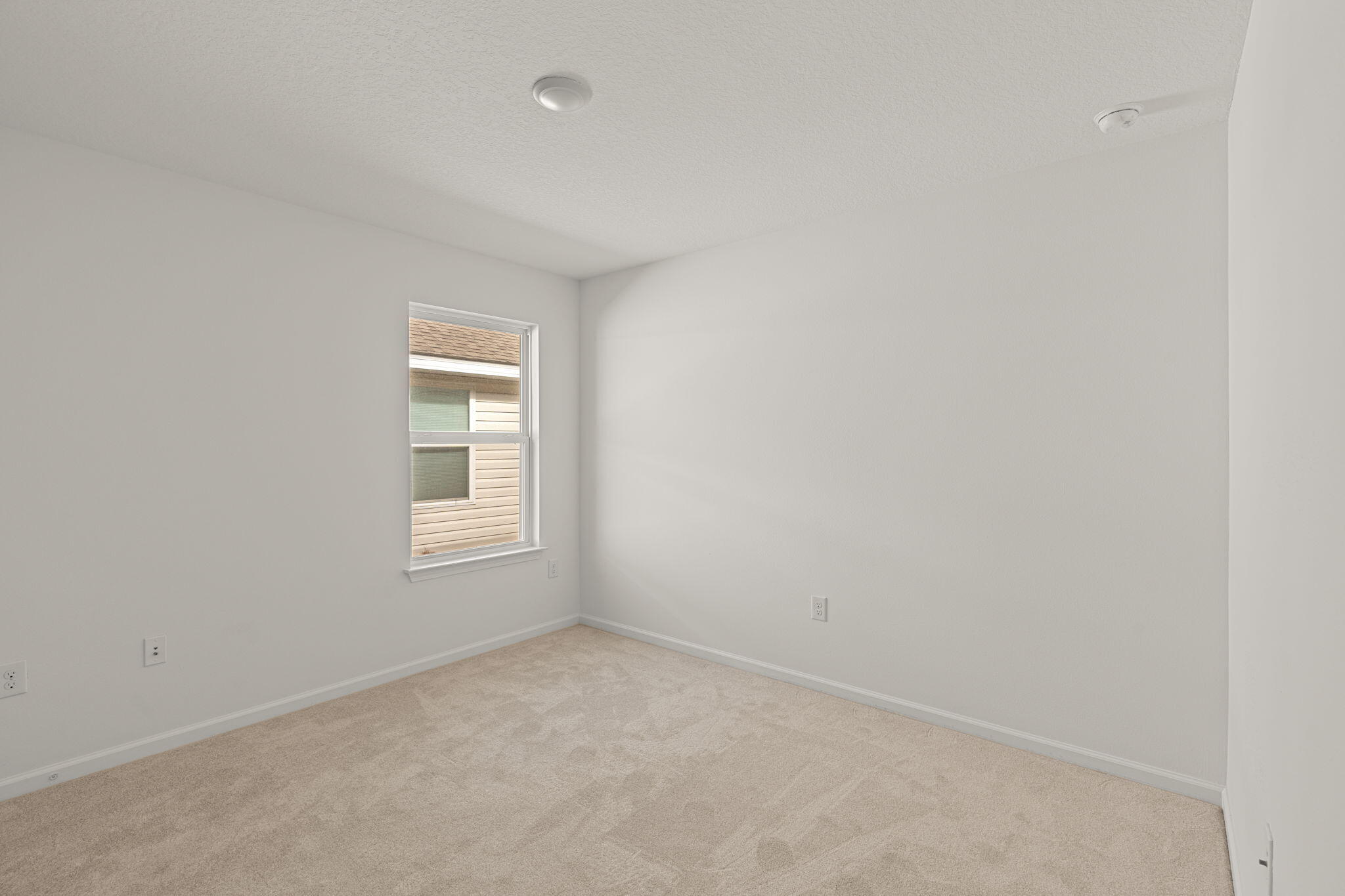 545 Earl Godwin Road Freeport, FL 32439 - Photo 24 of 50 an empty room with a window