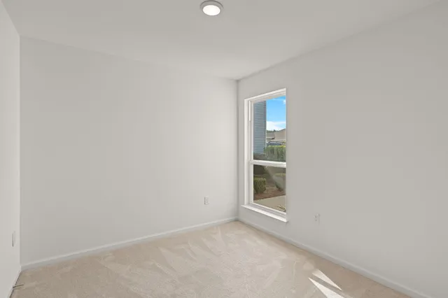 an empty room with window