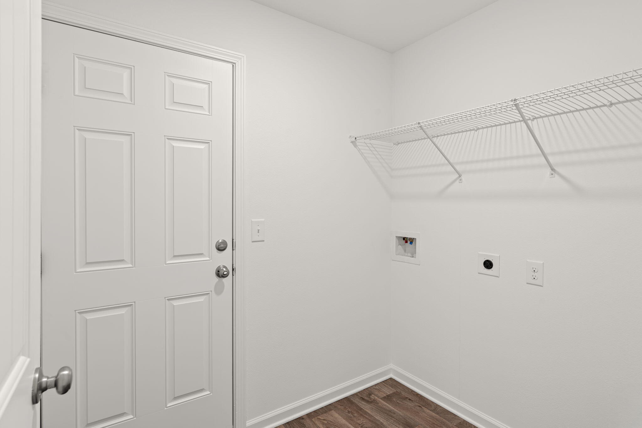 545 Earl Godwin Road Freeport, FL 32439 - Photo 31 of 50 a view of a room with racks on the wall