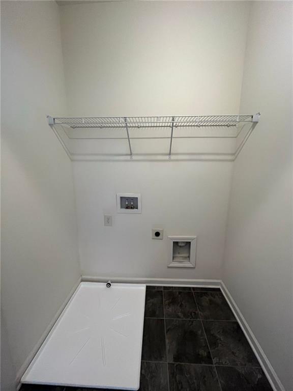 61 Howard Avenue Cartersville, GA 30121 - Photo 15 of 19 a view of a room with racks on the wall