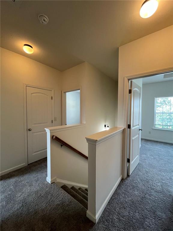 61 Howard Avenue Cartersville, GA 30121 - Photo 9 of 19 a view of a hallway with bathroom