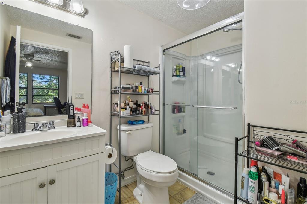 134 Sycamore Lane, Unit H Oldsmar, FL 34677 - Photo 20 of 44 a bathroom with a sink toilet and shower