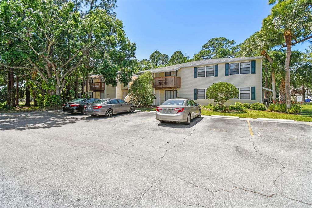 134 Sycamore Lane, Unit H Oldsmar, FL 34677 - Photo 2 of 44 a car parked in front of a house