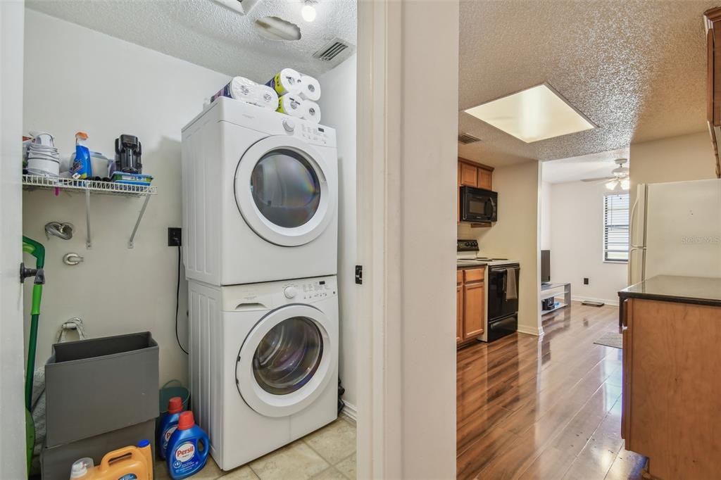 134 Sycamore Lane, Unit H Oldsmar, FL 34677 - Photo 31 of 44 a view of a storage and utility room with washer and dryer