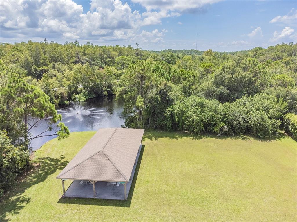 134 Sycamore Lane, Unit H Oldsmar, FL 34677 - Photo 37 of 44 a view of an outdoor space and a lake view
