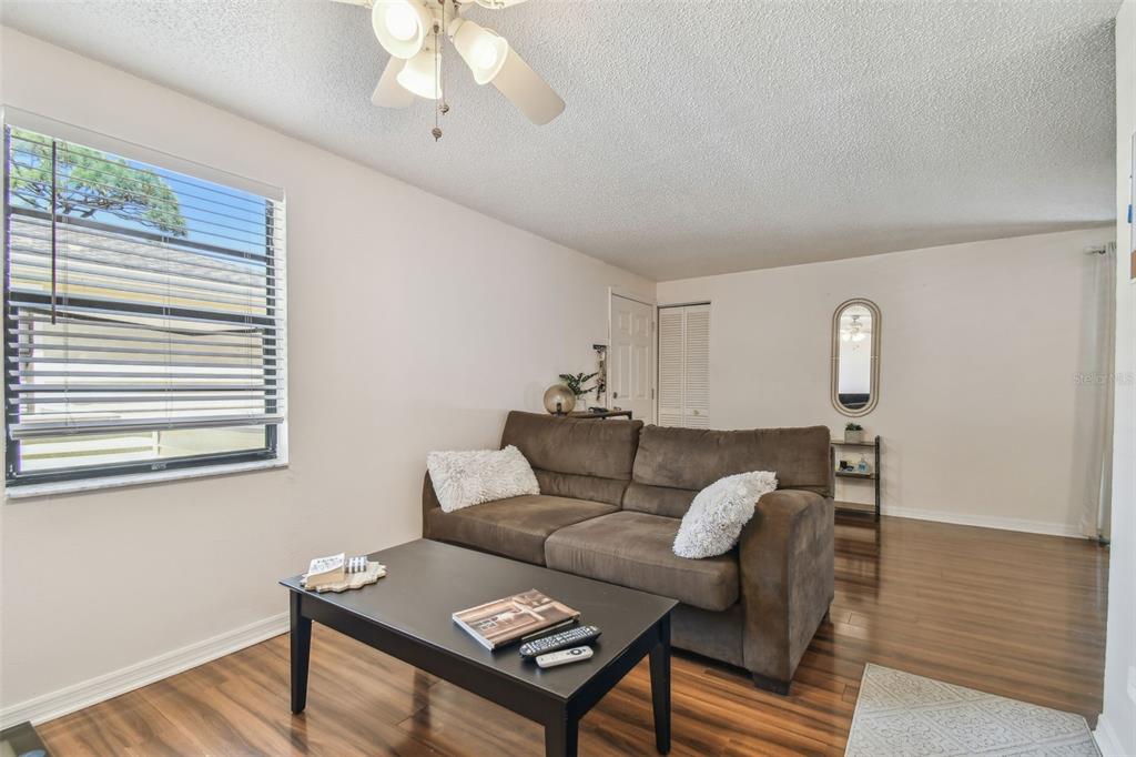 134 Sycamore Lane, Unit H Oldsmar, FL 34677 - Photo 7 of 44 a living room with furniture