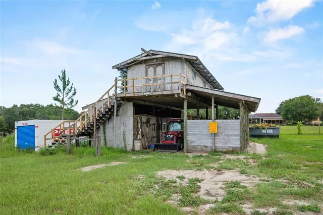 a view of a porch with furniture