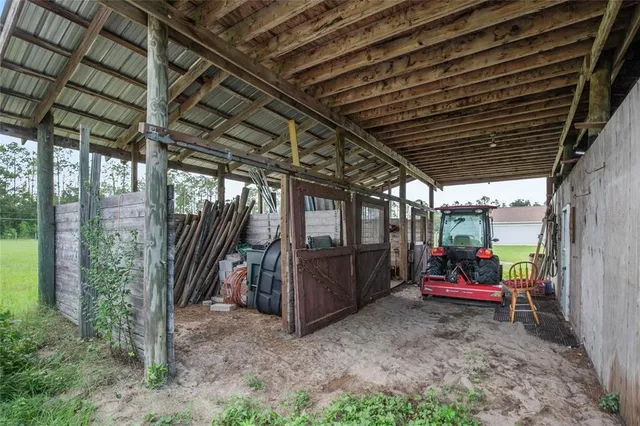 a view of a chair and table of the garden