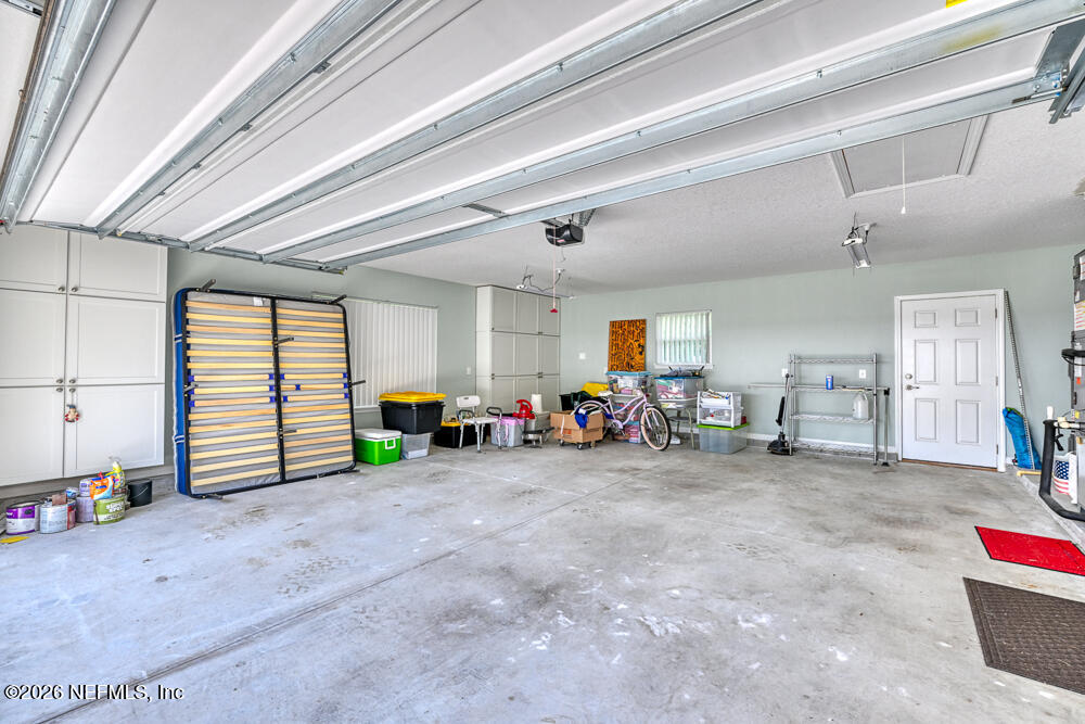 7837 Rusty Anchor Road St. Augustine, FL 32092 - Photo 33 of 41 Garage View storage cabinets