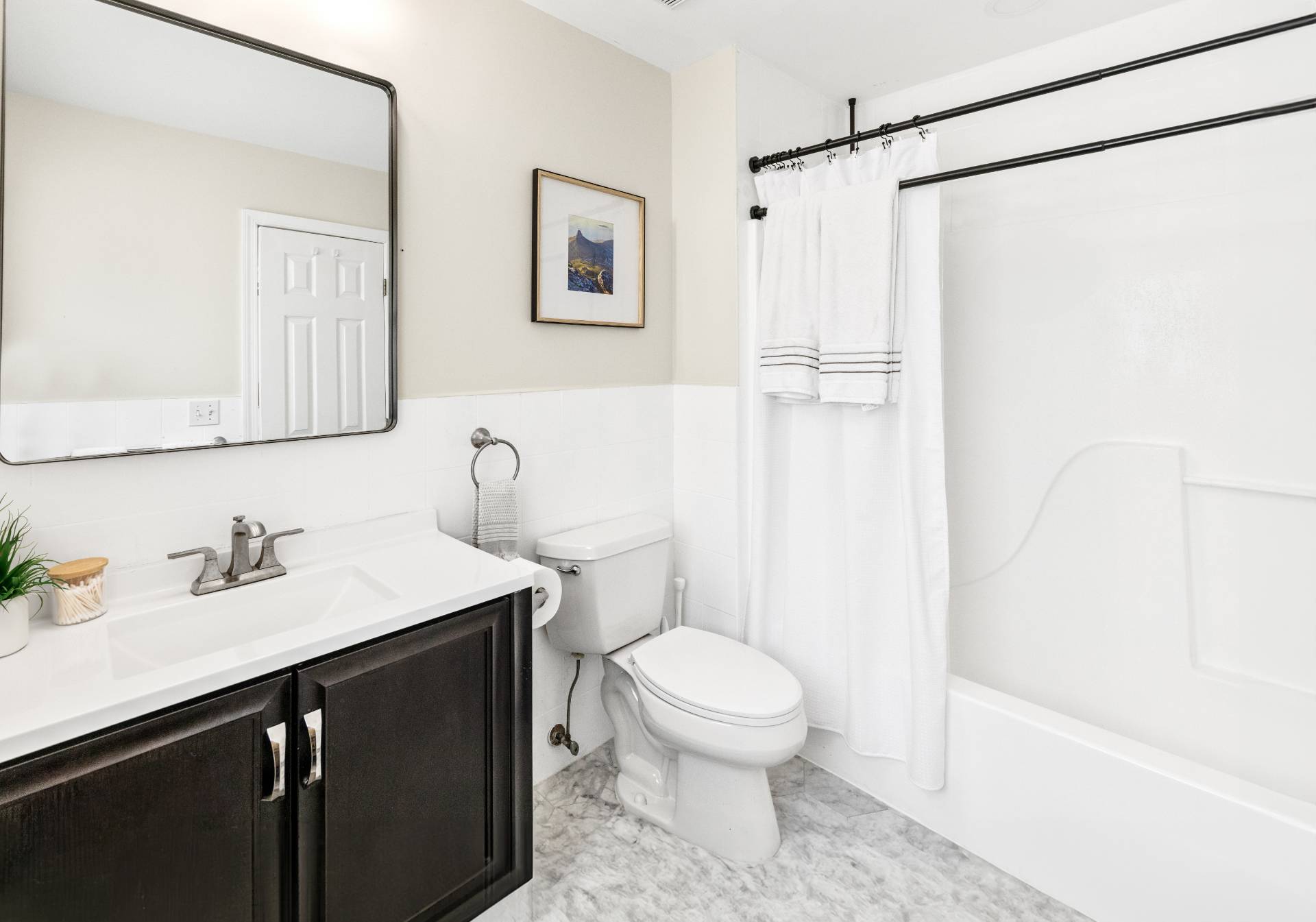 43 Shinnecock Road Hampton Bays, NY 11946 - Photo 13 of 17 a bathroom with a sink a toilet and shower