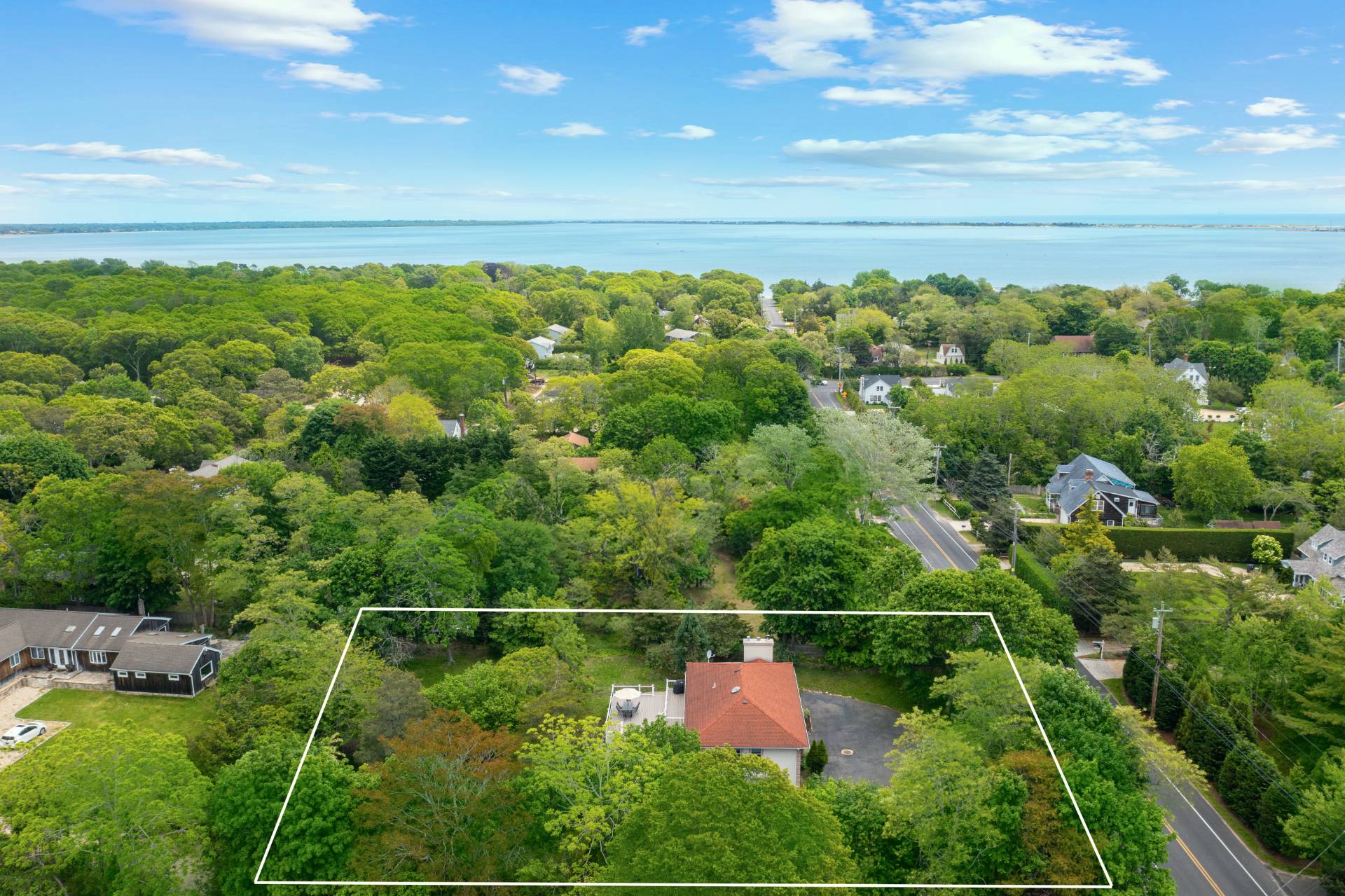 43 Shinnecock Road Hampton Bays, NY 11946 - Photo 17 of 17 a view of a yard