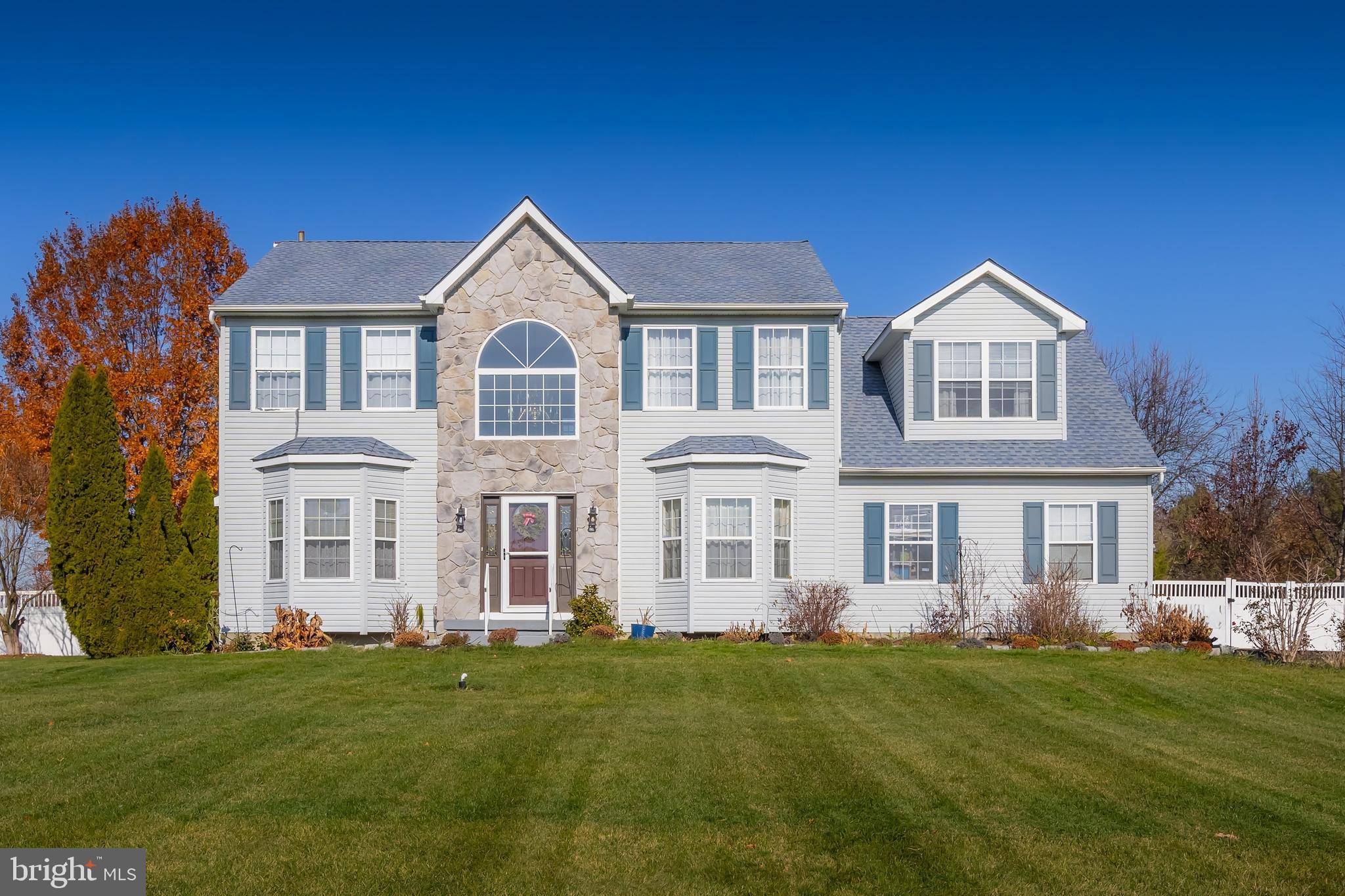 29 Peach Ridge Drive Mullica Hill, NJ 08062 - Photo 2 of 31 a front view of a house with a yard