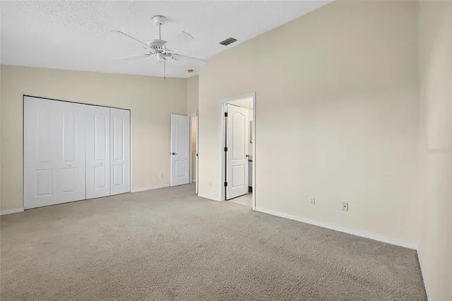 an empty room with a bathroom