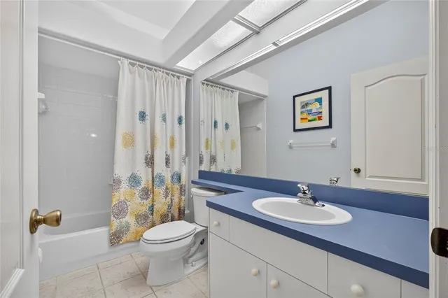 an empty room with a fan