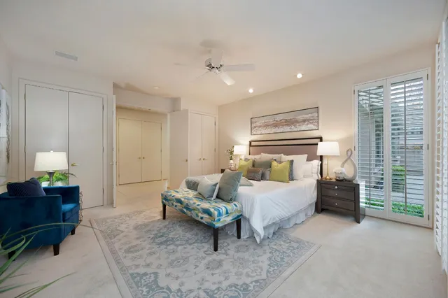 a view of a house with backyard sitting area and garden