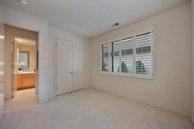a bathroom with a sink mirror toilet and bathtub