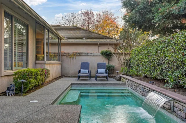 a view of a porch with furniture and a porch