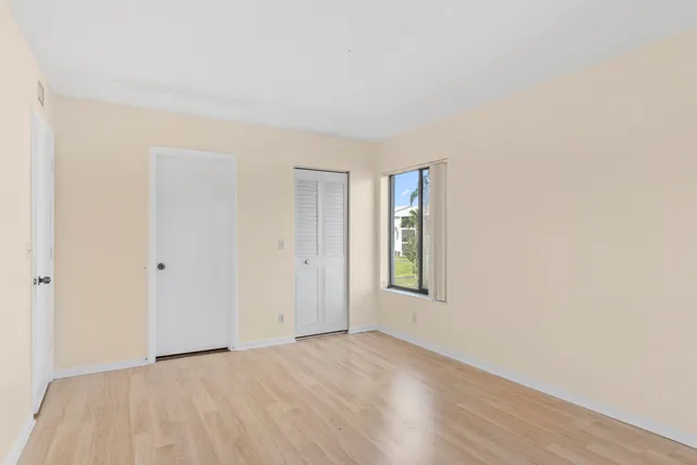 a view of an empty room and window