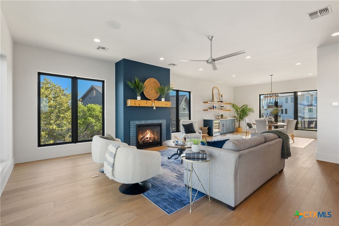175 Pointview Drive Marble Falls, TX 78654 - Photo 17 of 34 a living room with fireplace furniture and a fireplace