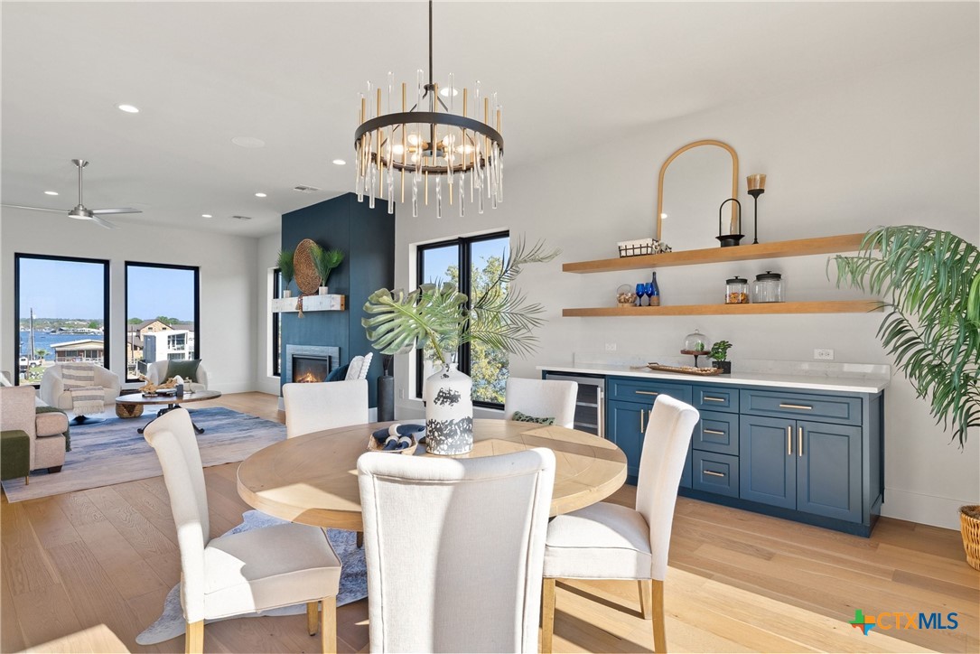 175 Pointview Drive Marble Falls, TX 78654 - Photo 18 of 34 a kitchen with kitchen island stainless steel appliances a dining table and chairs
