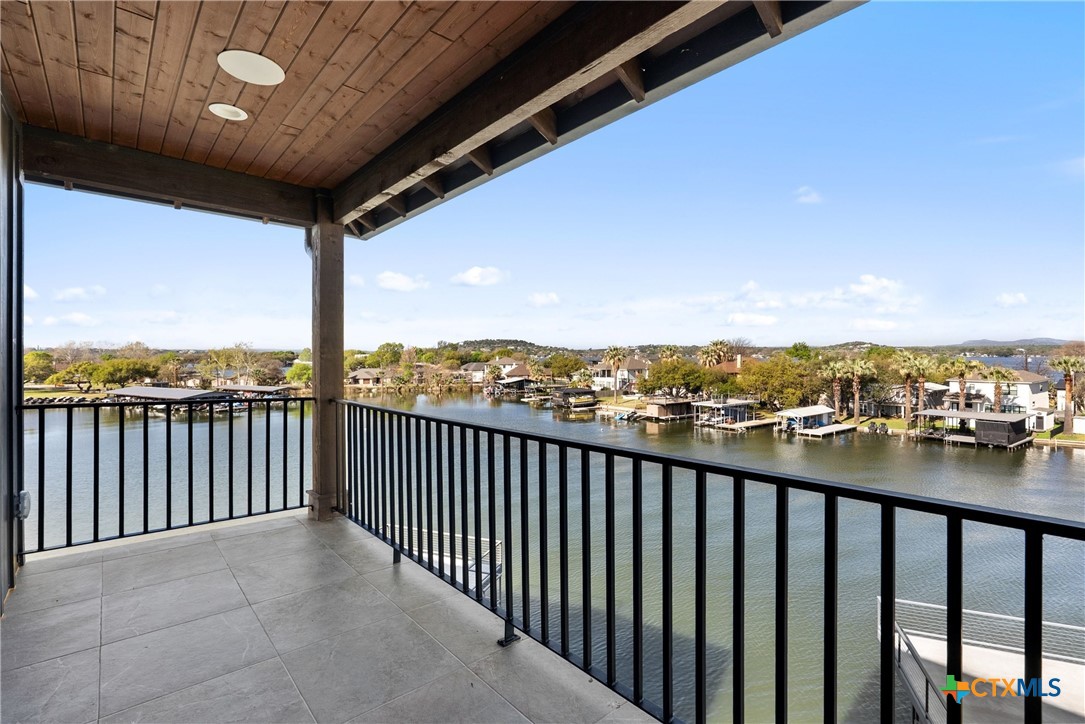 175 Pointview Drive Marble Falls, TX 78654 - Photo 28 of 34 a view of balcony with city view