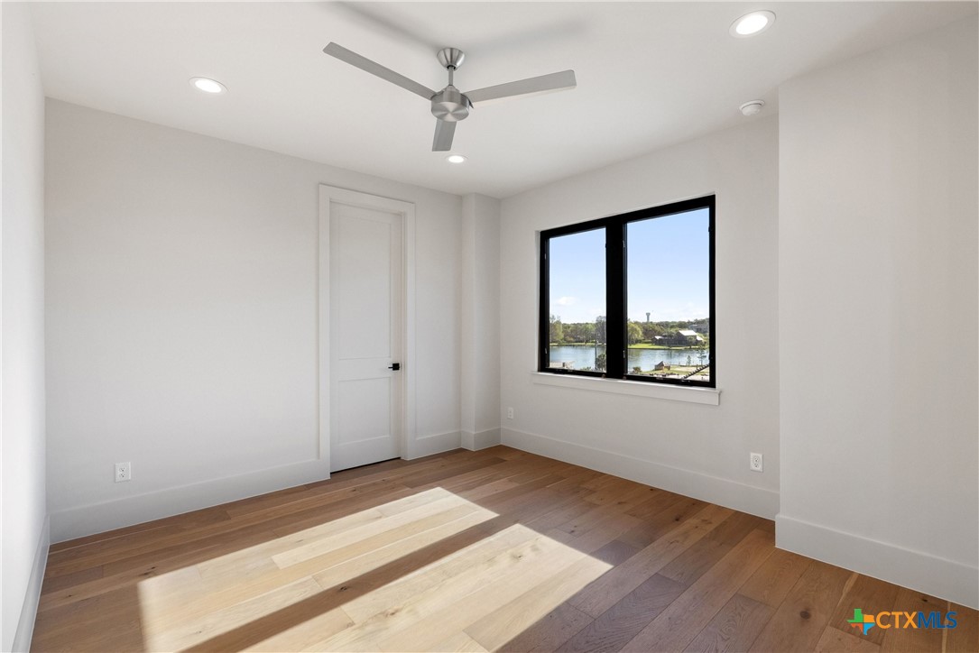 175 Pointview Drive Marble Falls, TX 78654 - Photo 31 of 34 a view of an empty room with a window