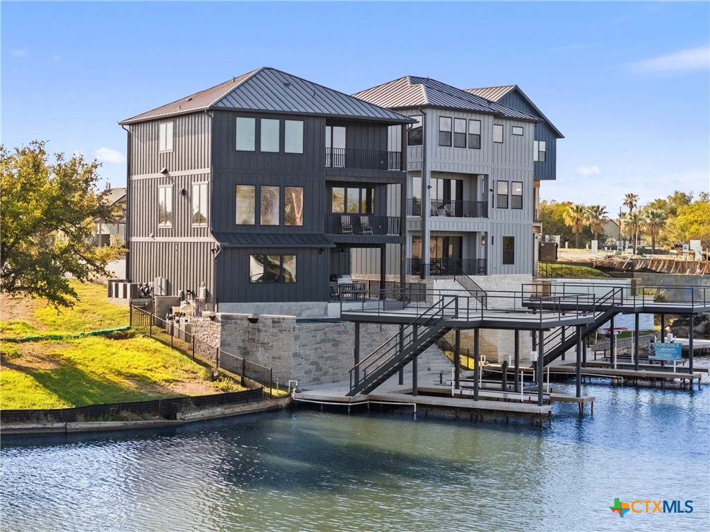 175 Pointview Drive Marble Falls, TX 78654 - Photo 33 of 34 a view of houses with swimming pool