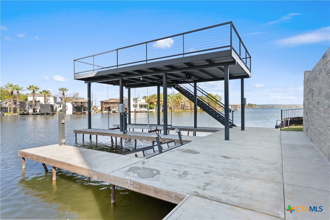 175 Pointview Drive Marble Falls, TX 78654 - Photo 10 of 34 a view of a swimming pool with a patio