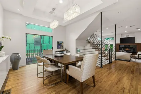 a kitchen with stainless steel appliances a sink and cabinets
