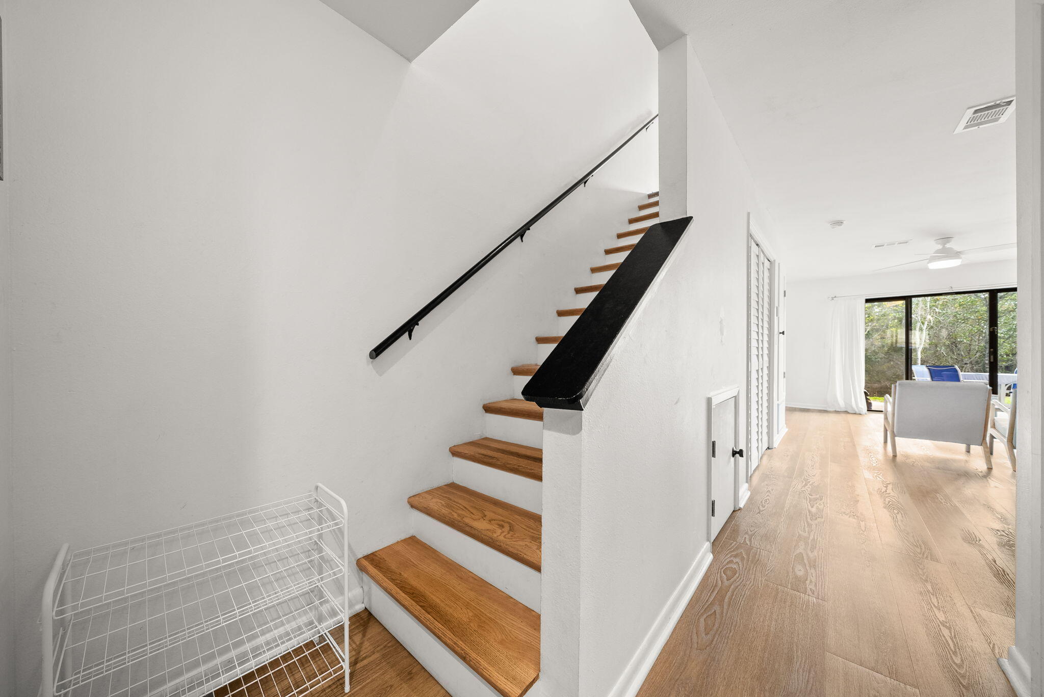 17620 Front Beach Road, Unit J2 Panama City Beach, FL 32413 - Photo 20 of 30 a view of entryway and hall with wooden floor