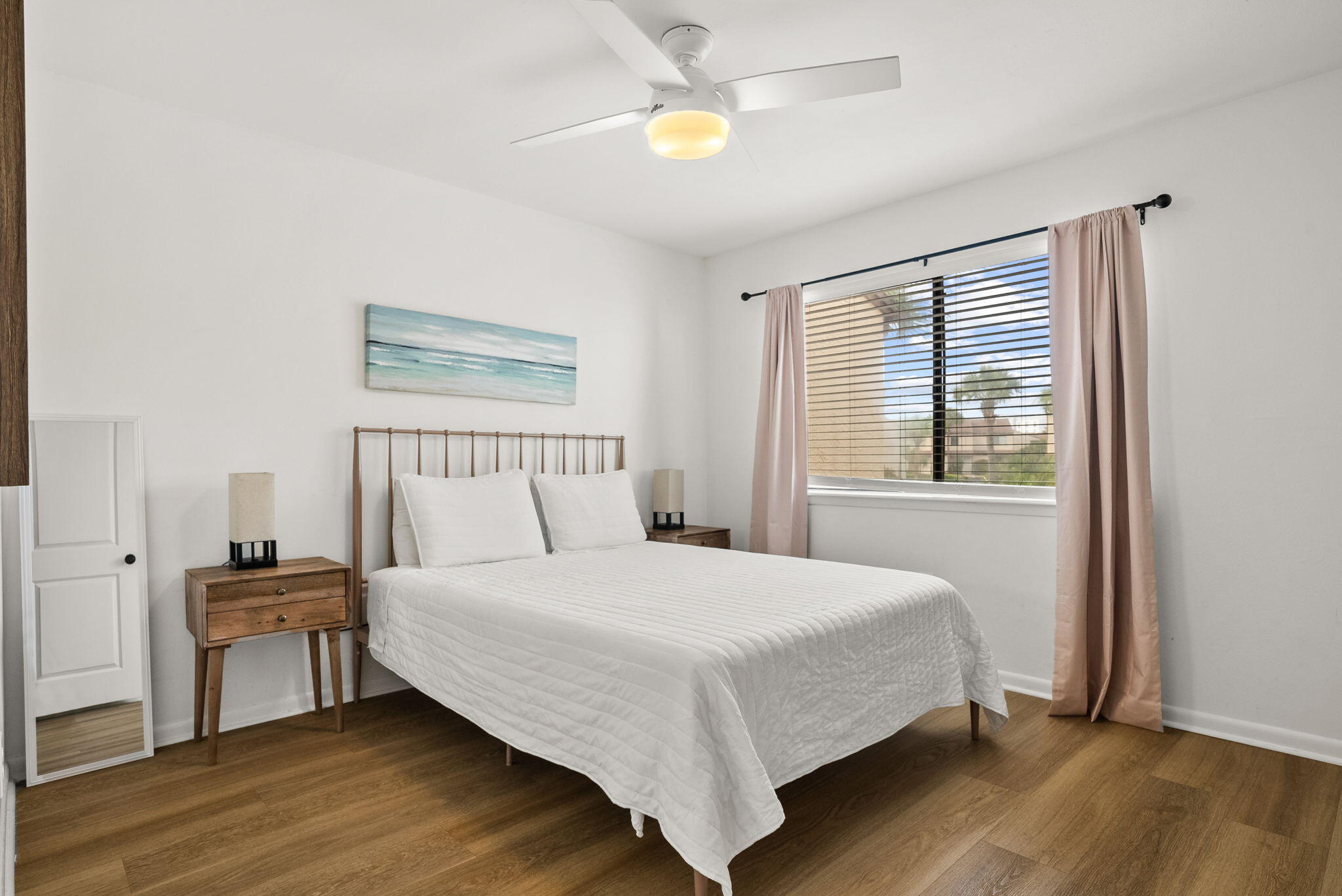 17620 Front Beach Road, Unit J2 Panama City Beach, FL 32413 - Photo 21 of 30 a bedroom with a bed and a window