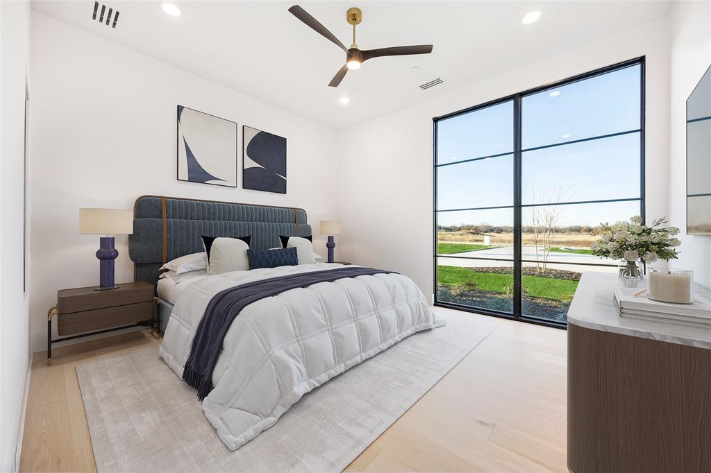 1410 Clydesdale Road Argyle, TX 76226 - Photo 22 of 40 a bedroom with a large bed and a window